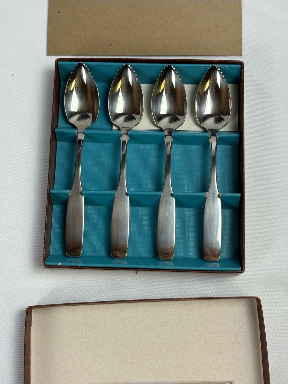 Oneida Community stainless steel Paul Revere, silver grapefruit spoons